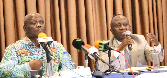 Dr John Kwakye (right), Director of Research, IFS stressing a point. With him is Prof Newman Kusi, Executive Director of IFS looks on